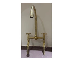 unlacquered brass faucet