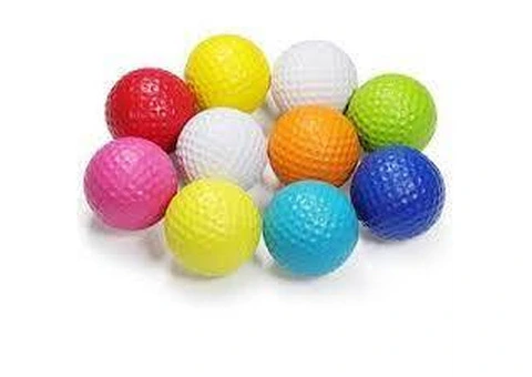 Specialty colored golf balls
