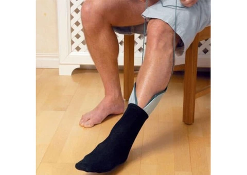 Using a sock Aid  helps a person to get dressed easily.