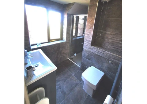 Bathroom fitters plumbing tiling - 8/20