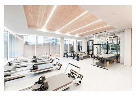 Enhances Core Strength with Reformer Pilates