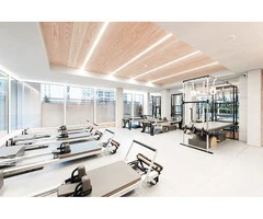 Enhances Core Strength with Reformer Pilates