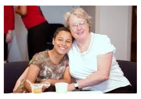 What are the benefits of becoming a foster carer in Camden?