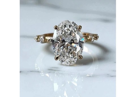 A Modern Classic Oval Diamond Engagement Ring by Layla Diamond