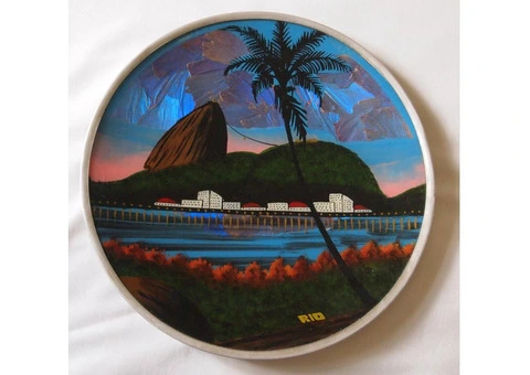 Rio wall plaque circa 1950 hand painted and adorned with blue butterfly wings for sky
