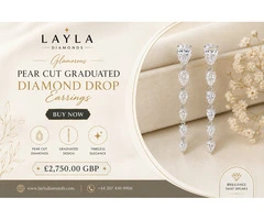 Glamorous Pear Cut Graduated Diamond Drop Earrings | Layla Diamonds
