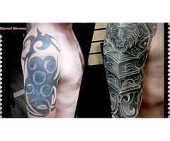 Expert Tattooist for Unique Designs - Eternal Nirvana