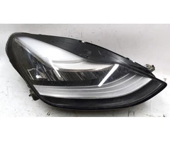 The spare right main headlight UP LEVEL (USA) is a non-conditioned spare for Tesla  1077372-00-K x