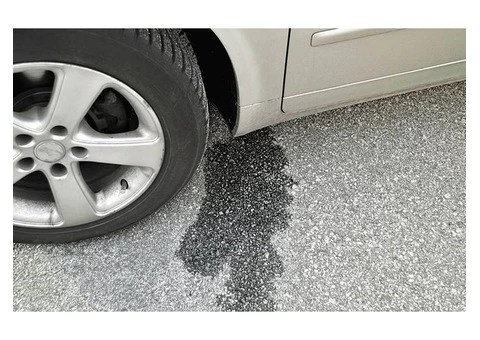 What Are the Causes and Symptoms of Fuel Leaking from Bottom of Car?